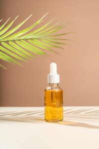 A dropper bottle with vitamin c for hair care. Marketing production line. Dropper bottle mockup