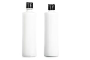 Studio shot of shampoo bottles isolated on white